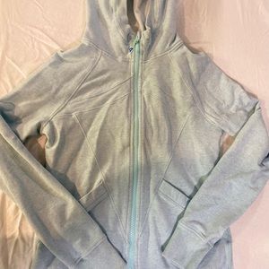 teal, zip up sweatshirt